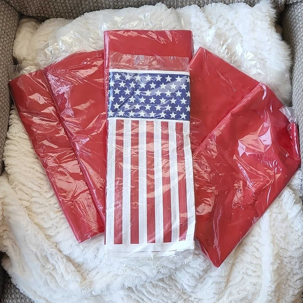 LOT OF 6 54 X 96 INCH PLASTIC TABLECLOTHS,  AMERICAN FLAG AND RED DESIGNS